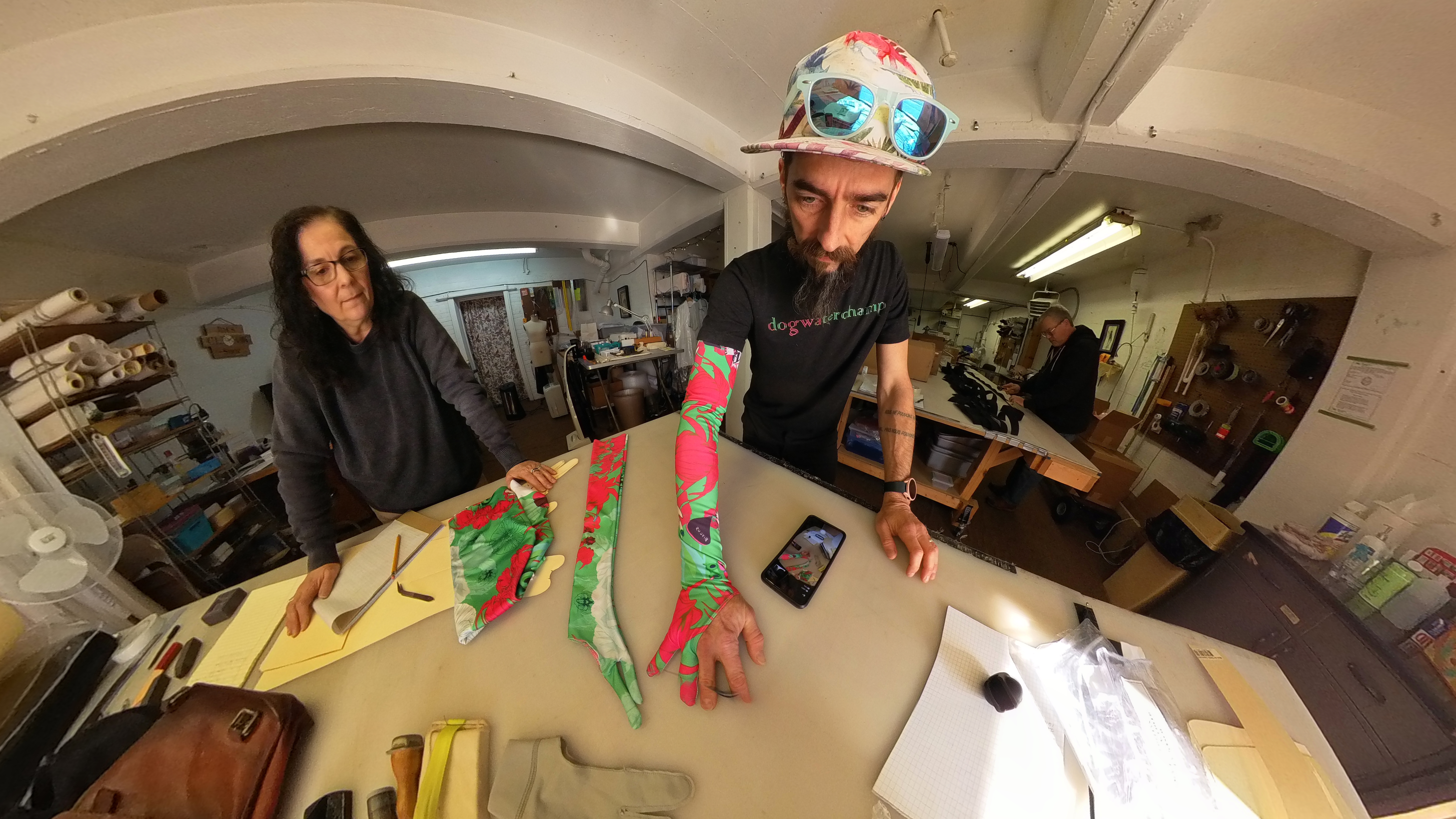 Gene Stovicek testing the fit and forearm coverage of the DogWaterChamp Drawing Sleeve
